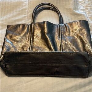 Estee Lauder Silver Tote Bag with Structured Design